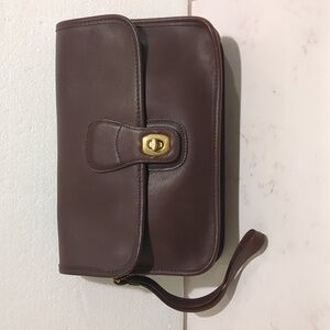 Vintage Coach Turnlock Leather Clutch Bag with a Wrist Handle